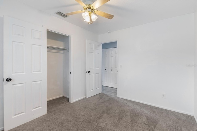 926 Everett St, Lake Alfred, FL 33850 - unfurnished bedroom featuring carpet floors, baseboards, a closet, and a ceiling fan