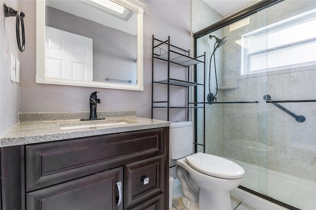 926 Everett St, Lake Alfred, FL 33850 - bathroom with vanity, a shower stall, toilet, and tile patterned flooring