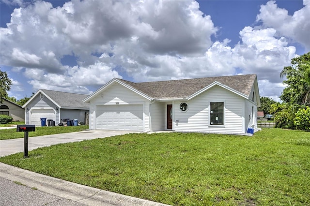 ranch-style house with a garage and a front yard