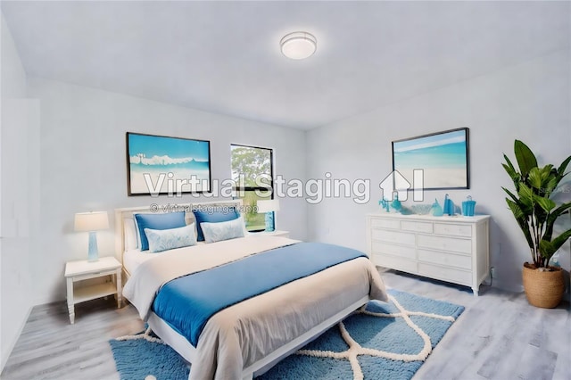 bedroom with light wood-type flooring