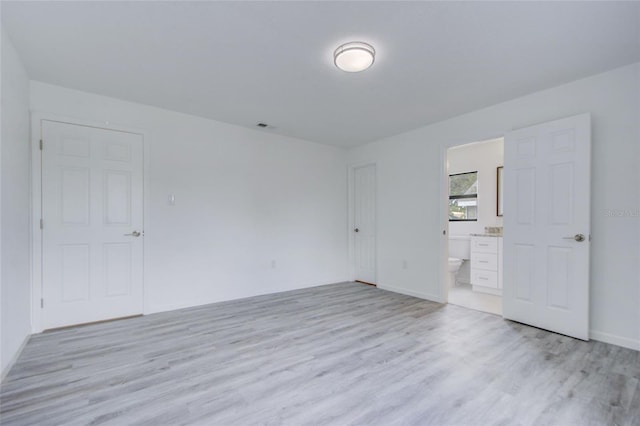 empty room featuring light wood-type flooring