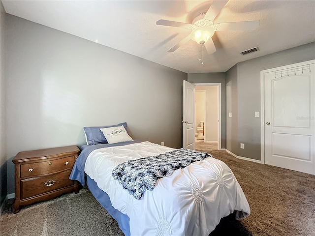 bedroom with visible vents, carpet flooring, baseboards, and ceiling fan