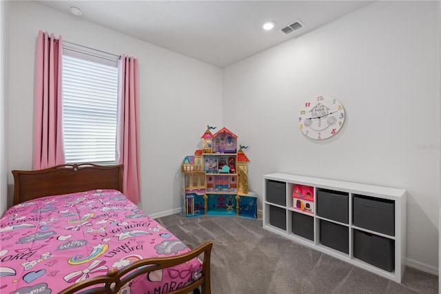 bedroom with dark carpet