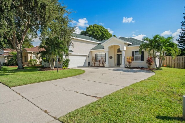 view of front of home featuring a front lawn