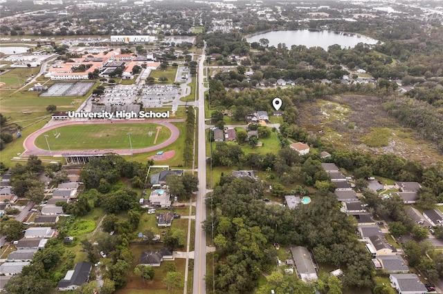 birds eye view of property featuring a water view