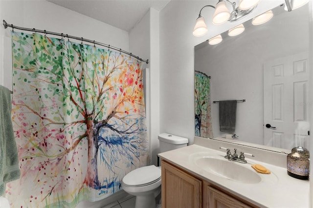 bathroom with walk in shower, vanity, toilet, and tile patterned floors