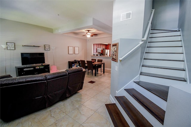 living room with ceiling fan