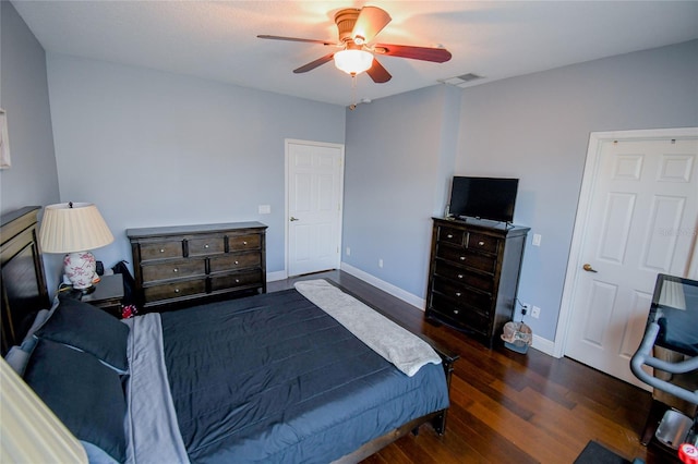 bedroom featuring dark wood-type flooring and ceiling fan