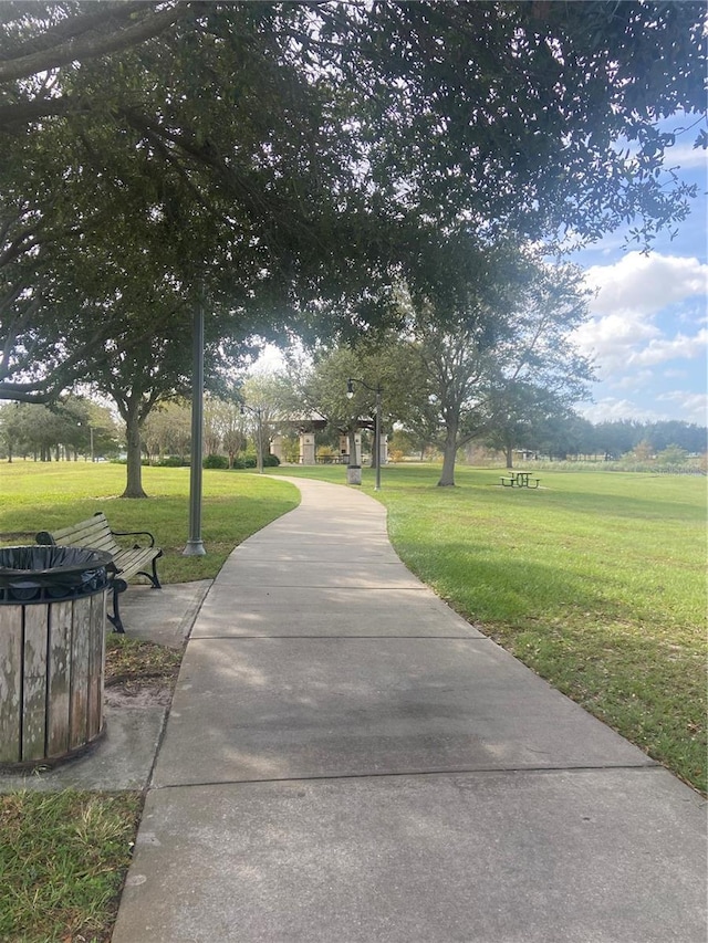 surrounding community with a lawn