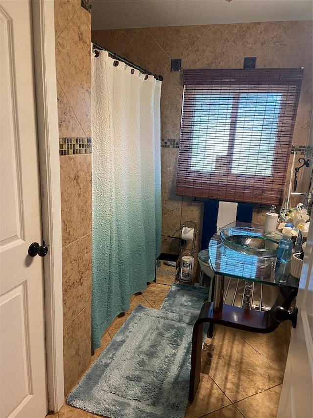 bathroom with tile patterned flooring and a shower with curtain