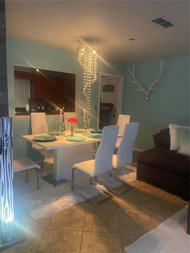 tiled dining area with visible vents