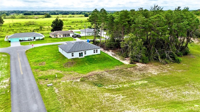 birds eye view of property featuring a rural view