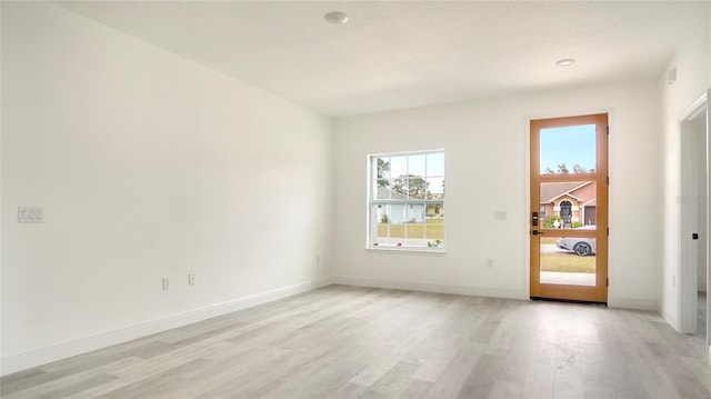 empty room featuring light hardwood / wood-style floors