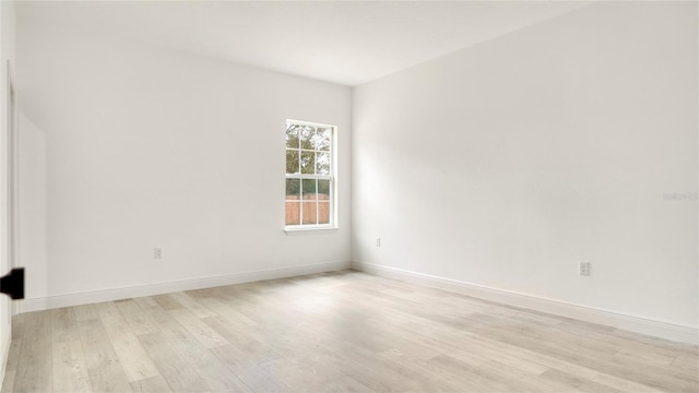 empty room featuring light hardwood / wood-style floors