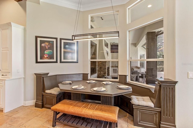 dining room featuring ornamental molding