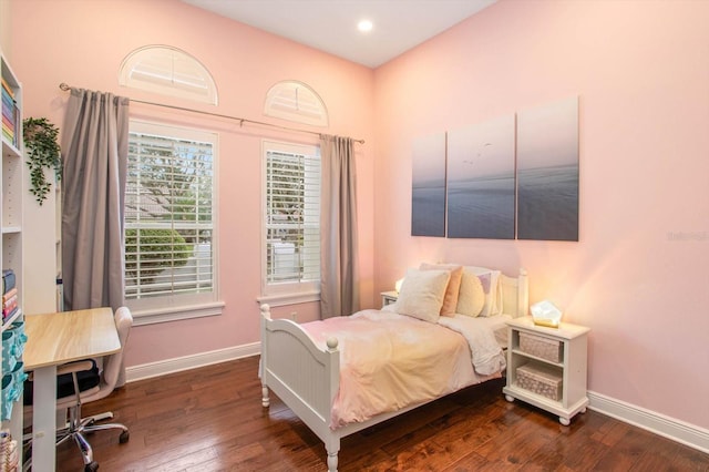 bedroom featuring dark hardwood / wood-style floors