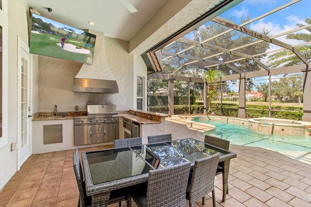 view of patio / terrace with a grill, a swimming pool with hot tub, sink, area for grilling, and glass enclosure