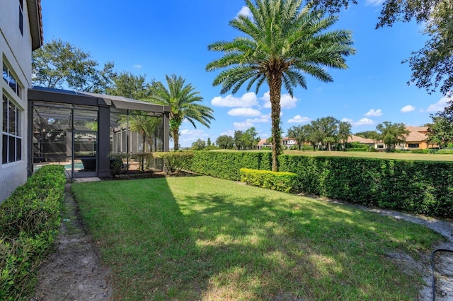 view of yard featuring a lanai