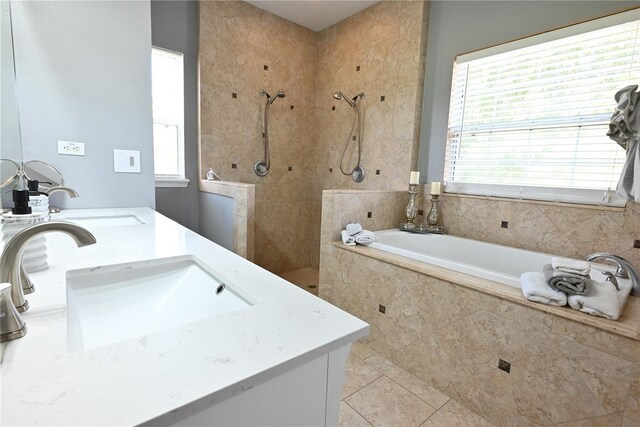 bathroom with vanity, shower with separate bathtub, and tile patterned flooring