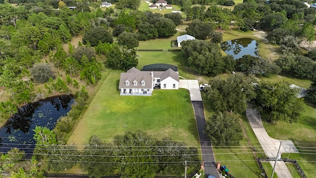 drone / aerial view featuring a water view