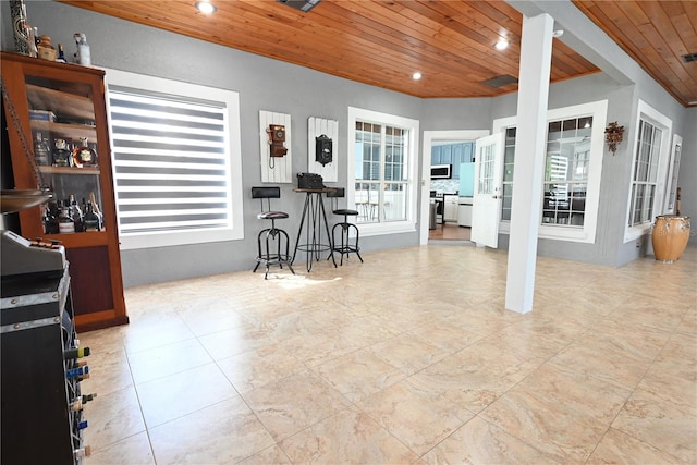 interior space with wooden ceiling