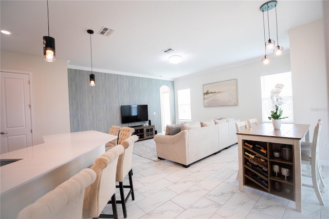 living room featuring ornamental molding