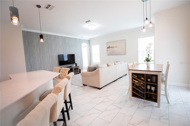 living room with ornamental molding