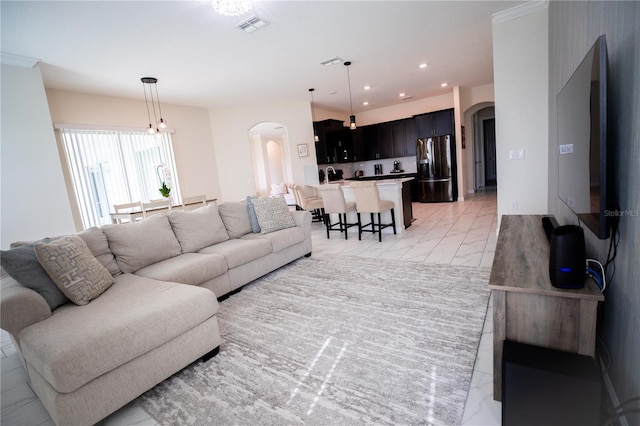 living room with crown molding