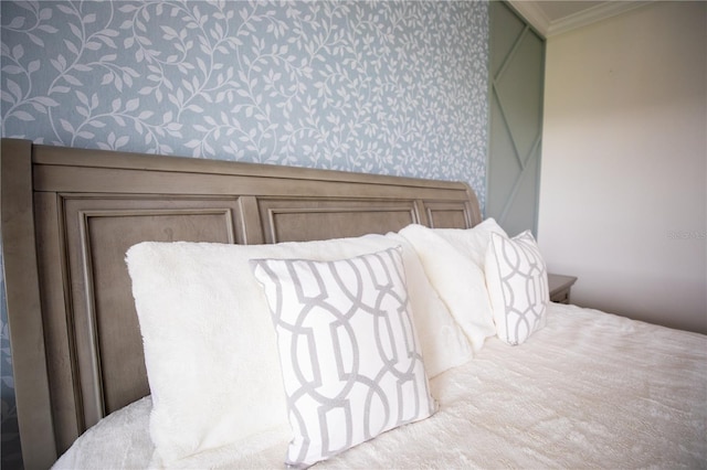 bedroom featuring crown molding