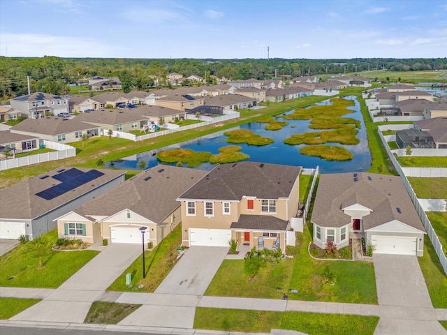 drone / aerial view with a water view