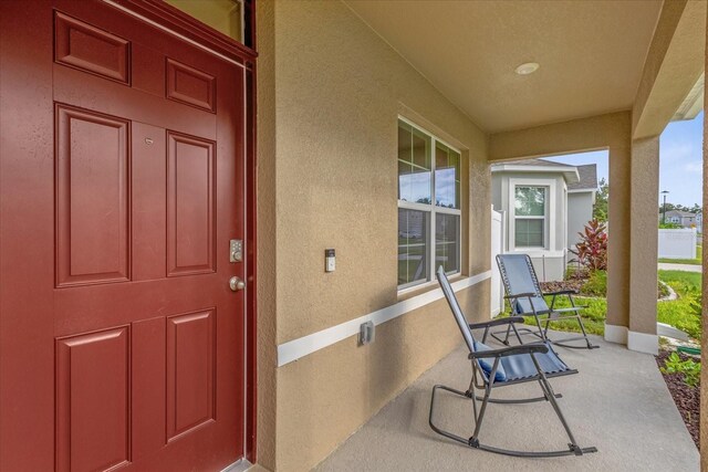 property entrance with a porch