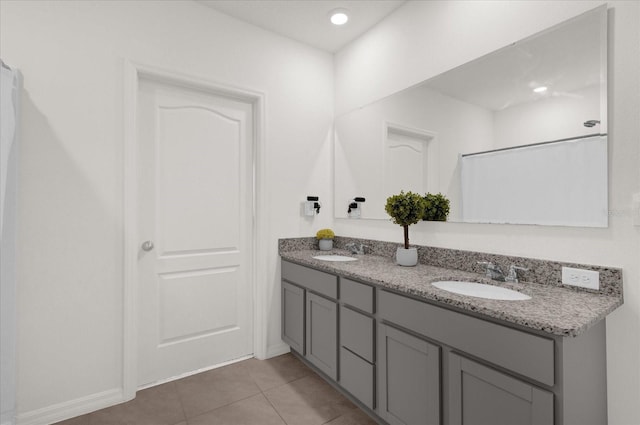 bathroom with vanity and tile patterned floors