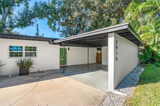 view of car parking with a carport