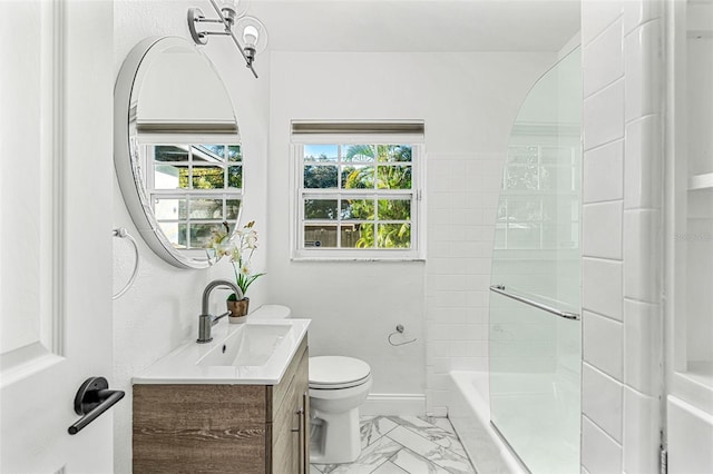 bathroom featuring toilet and vanity