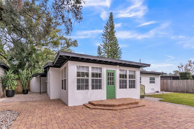 back of house featuring a patio area