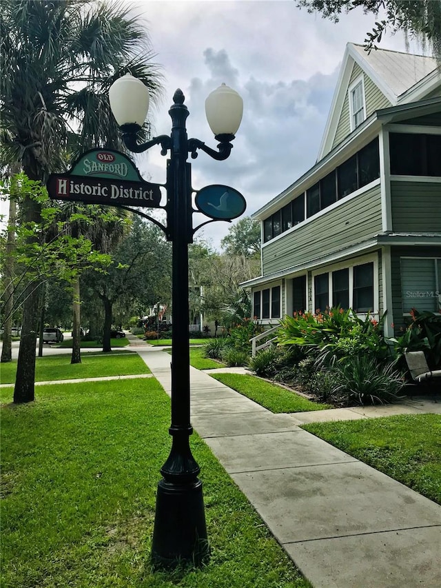 surrounding community featuring a yard