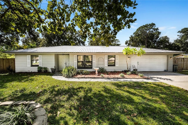 single story home with a front lawn and a garage