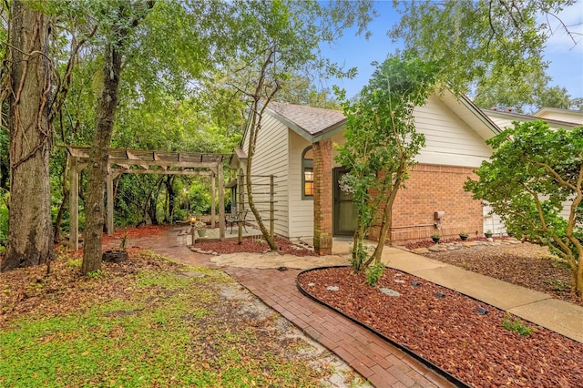 exterior space with a patio and a pergola