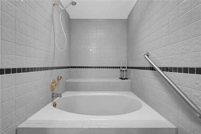 bathroom featuring separate shower and tub