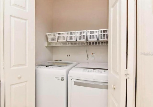 laundry room featuring independent washer and dryer