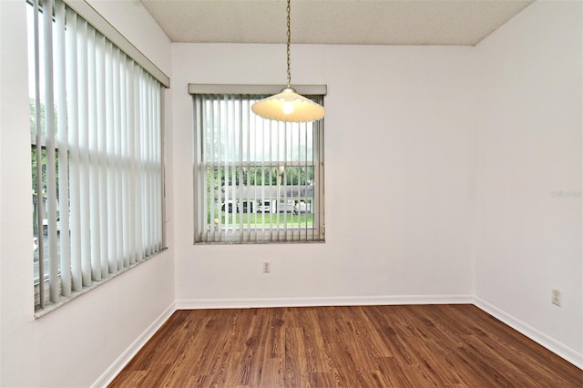 570 Cranes Way Unit 248, Altamonte Springs, FL 32701 - unfurnished dining area with wood finished floors and baseboards