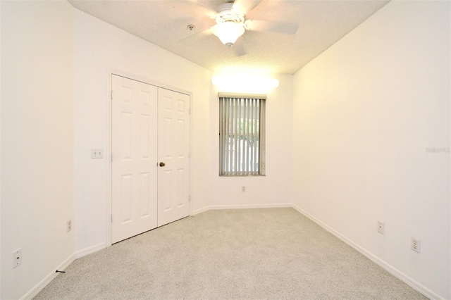 570 Cranes Way Unit 248, Altamonte Springs, FL 32701 - unfurnished bedroom featuring light colored carpet, a closet, and baseboards