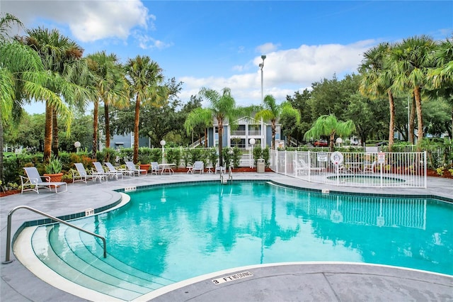 view of swimming pool with a patio