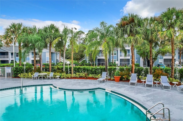 view of swimming pool with a patio area