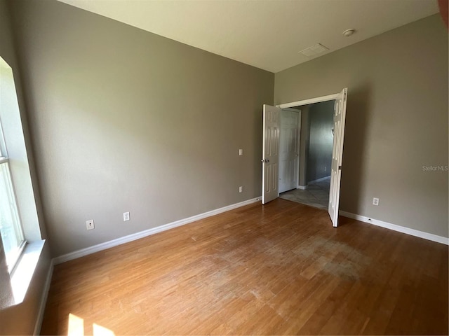 empty room with light wood-type flooring