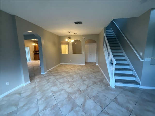 interior space featuring a notable chandelier