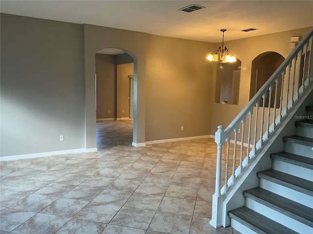 interior space featuring a notable chandelier