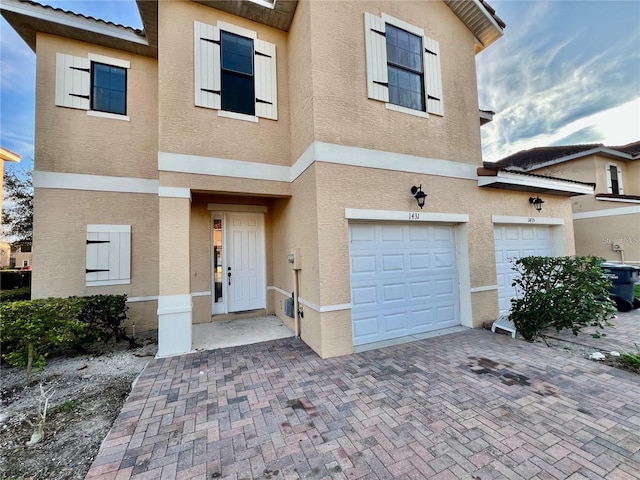 view of front of house with a garage