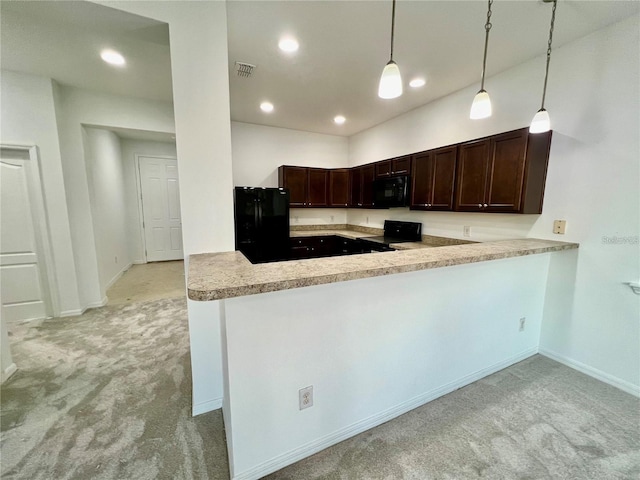 kitchen featuring light carpet, black appliances, kitchen peninsula, and hanging light fixtures