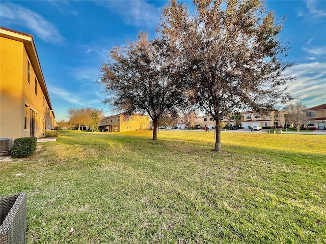 view of yard featuring central AC